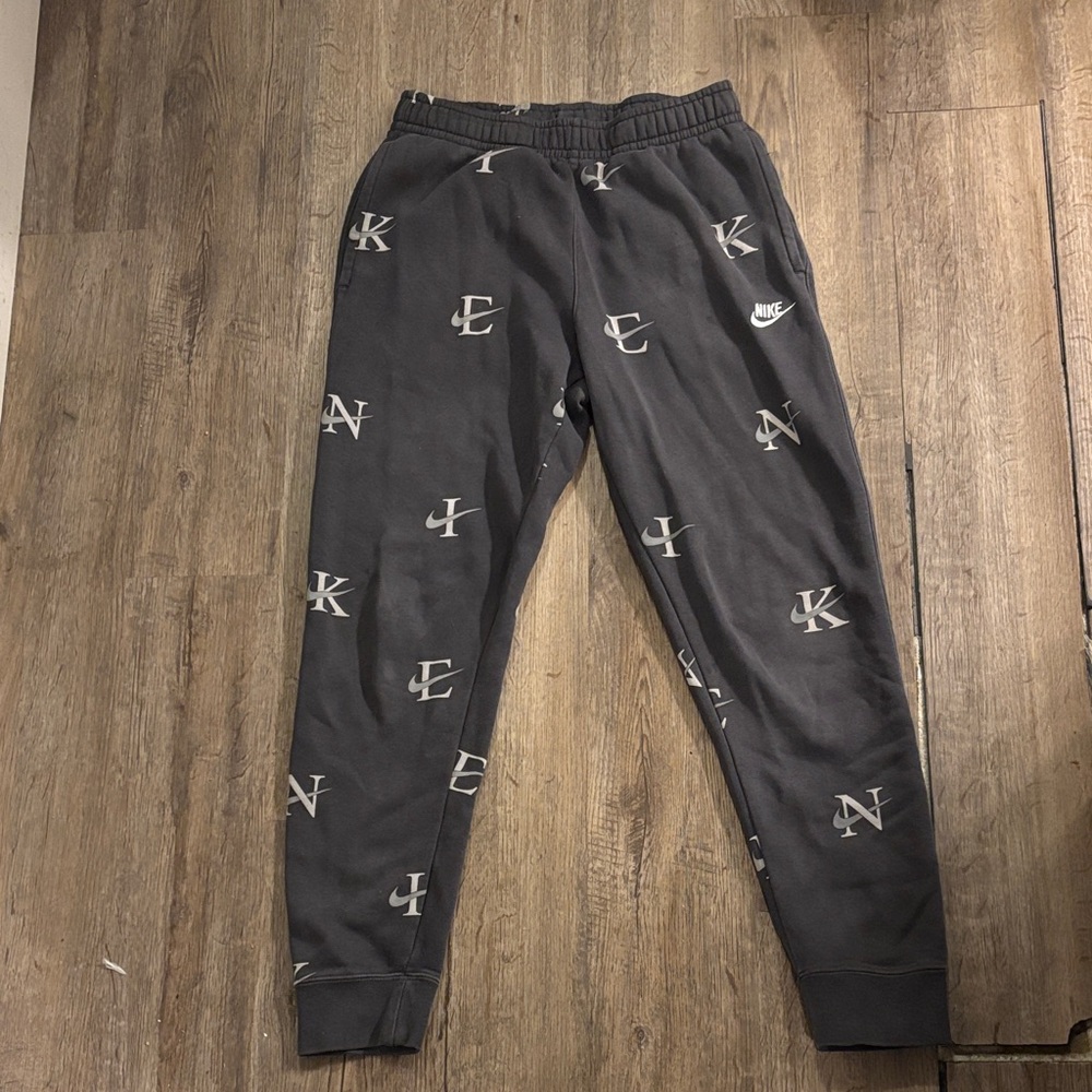 Nike men’s Joggers with Logo Pattern